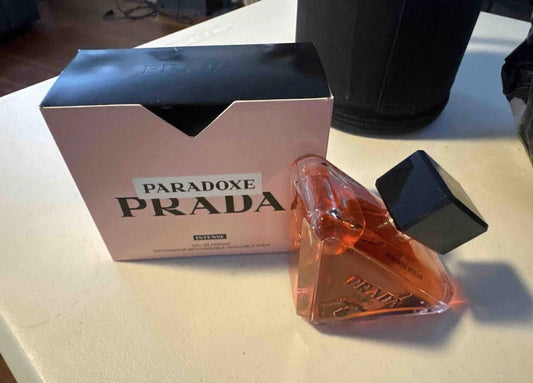 Prada Paradoxe perfume bottle and packaging on a table