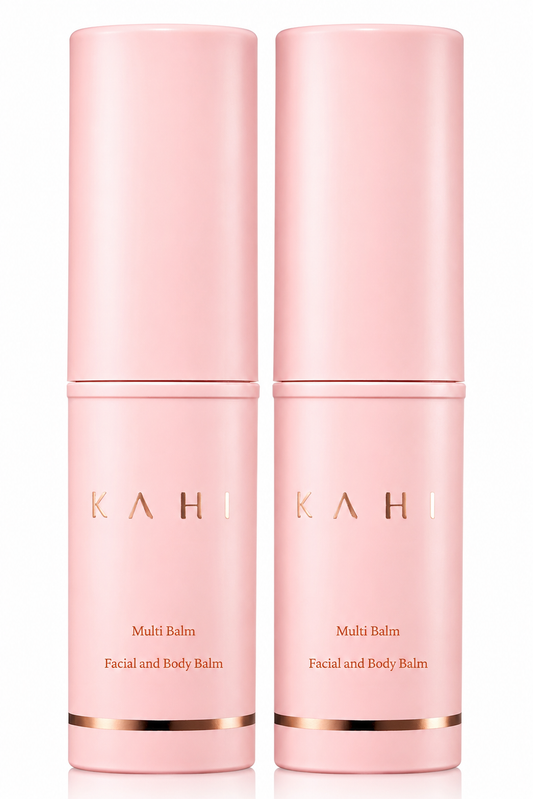 Two pink skincare bottles labeled 'Kahi' on a white background